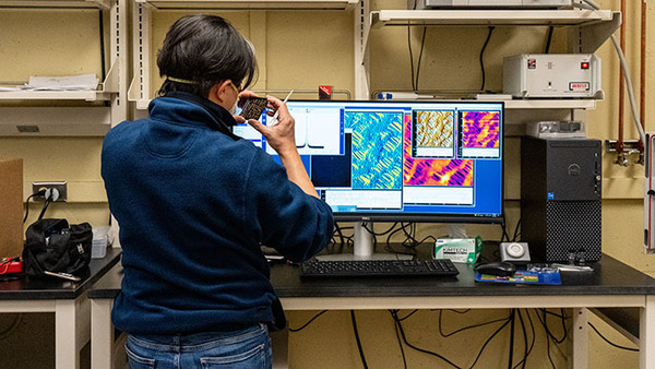 Researcher works in the Analytical Science and Engineering Core Facility at University of Notre Dame.