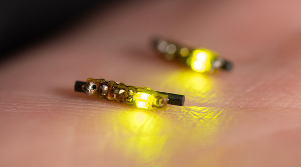 Miniature, implantable LED device that fights cancer